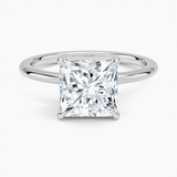 Petite 1.5mm Engagement Ring with a Princess cut diamond in white gold — top view
