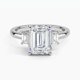 Petite Rhiannon Three Stone Diamond Engagement Ring with a Emerald cut diamond in white gold — top view