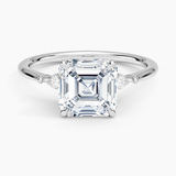 Petite Cometa Three Stone Diamond Engagement Ring with a Asscher cut diamond in white gold — top view