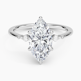 Petite Cometa Three Stone Diamond Engagement Ring with a Marquise cut diamond in white gold — top view