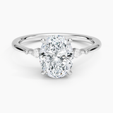Petite Cometa Three Stone Diamond Engagement Ring with a Oval cut diamond in white gold — top view