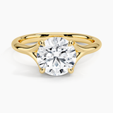 Reverie Solitaire Engagement Ring with a Round cut diamond in yellow gold — top view