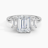 Luxe Rhiannon Three Stone Diamond Engagement Ring with a Emerald cut diamond in white gold — top view