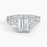 Budding Willow Three Stone Diamond Engagement Ring with a Emerald cut diamond in white gold — top view