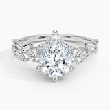 Budding Willow Three Stone Diamond Engagement Ring with a Pear cut diamond in white gold — top view