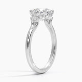 Floating Three Stone Diamond Engagement Ring with a Round cut diamond in white gold — side view