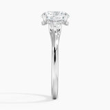 Floating Three Stone Diamond Engagement Ring with a Round cut diamond in white gold — profile view