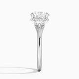 Luxe Floating Three Stone Diamond Engagement Ring with a Round cut diamond in white gold — profile view