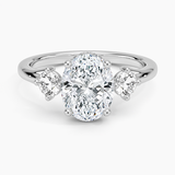 Luxe Floating Three Stone Diamond Engagement Ring with a Oval cut diamond in white gold — top view