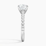 Sienna Half Coverage Diamond Engagement Ring with a Round cut diamond in white gold — profile view