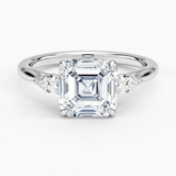 Floating Three Stone Pear Diamond Engagement Ring with a Asscher cut diamond in white gold — top view