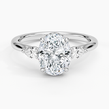Floating Three Stone Pear Diamond Engagement Ring with a Oval cut diamond in white gold — top view