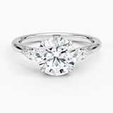 Floating Three Stone Pear Diamond Engagement Ring with a Round cut diamond in white gold — top view