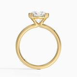 Annika Half Bezel Solitaire Engagement Ring with a Round cut diamond in yellow gold — profile view