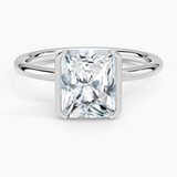 Annika Half Bezel Solitaire Engagement Ring with a Radiant cut diamond in white gold — top view