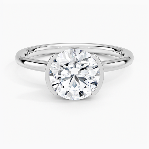 Annika Half Bezel Solitaire Engagement Ring with a Round cut diamond in white gold — top view
