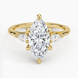 Delilah Three Stone Pear Diamond Engagement Ring with a Marquise cut diamond in yellow gold — top view