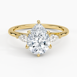 Delilah Three Stone Pear Diamond Engagement Ring with a Pear cut diamond in yellow gold — top view
