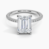 Ballad Half Coverage Diamond Engagement Ring with a Emerald cut diamond in white gold — top view