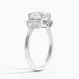 Vertical Baguette Three Stone Diamond Engagement Ring with a Round cut diamond in white gold — side view