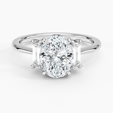 Vertical Baguette Three Stone Diamond Engagement Ring with a Oval cut diamond in white gold — top view