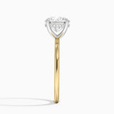 Adorned Mixed Metal Diamond Engagement Ring with a Round cut diamond in yellow gold — profile view