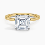 Adorned Mixed Metal Diamond Engagement Ring with a Asscher cut diamond in yellow gold — top view