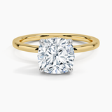 Adorned Mixed Metal Diamond Engagement Ring with a Cushion cut diamond in yellow gold — top view