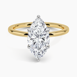 Adorned Mixed Metal Diamond Engagement Ring with a Marquise cut diamond in yellow gold — top view