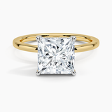 Adorned Mixed Metal Diamond Engagement Ring with a Princess cut diamond in yellow gold — top view