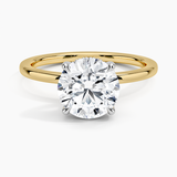 Adorned Mixed Metal Diamond Engagement Ring with a Round cut diamond in yellow gold — top view