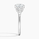 Rosette Diamond Engagement Ring with a Round cut diamond in white gold — profile view