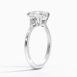 Aria Three Stone Diamond Engagement Ring with a Round cut diamond in white gold — side view