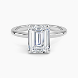 Elodie 1.8mm Solitaire Engagement Ring with a Emerald cut diamond in white gold — top view