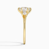 Delilah Three Stone Diamond Engagement Ring with a Round cut diamond in yellow gold — profile view