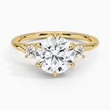 Delilah Three Stone Diamond Engagement Ring with a Round cut diamond in yellow gold — top view