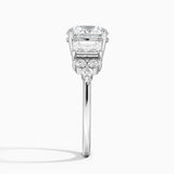 Sabine Cluster Diamond Engagement Ring with a Round cut diamond in white gold — profile view