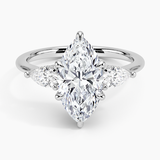 Adorned Opera Three Stone Diamond Engagement Ring with a Marquise cut diamond in white gold — top view
