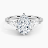 Adorned Opera Three Stone Diamond Engagement Ring with a Pear cut diamond in white gold — top view