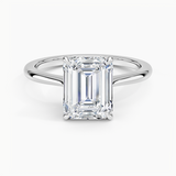 Elle Solitaire Engagement Ring with a Emerald cut diamond in white gold — top view