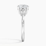Selene Three Stone Diamond Engagement Ring with a Round cut diamond in white gold — profile view
