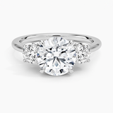 Petal Three Stone Diamond Engagement Ring with a Round cut diamond in white gold — top view