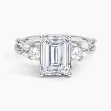 Willow Three Stone Diamond Engagement Ring with a Emerald cut diamond in white gold — top view