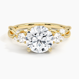 Willow Three Stone Diamond Engagement Ring with a Round cut diamond in yellow gold — top view