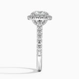Sienna Halo Half Coverage Diamond Engagement Ring with a Round cut diamond in white gold — profile view
