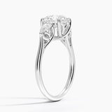 Trellis Three Stone Pear Diamond Engagement Ring with a Round cut diamond in white gold — side view