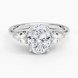 Trellis Three Stone Pear Diamond Engagement Ring with a Oval cut diamond in white gold — top view