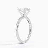Delicate Shared Prong Diamond Engagement Ring with a Round cut diamond in white gold — side view