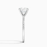 Delicate Shared Prong Diamond Engagement Ring with a Round cut diamond in white gold — profile view