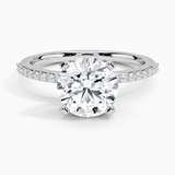Delicate Shared Prong Diamond Engagement Ring with a Round cut diamond in white gold — top view